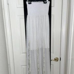 Strapless maxi dress with knee length liner. Also great for a cover up.